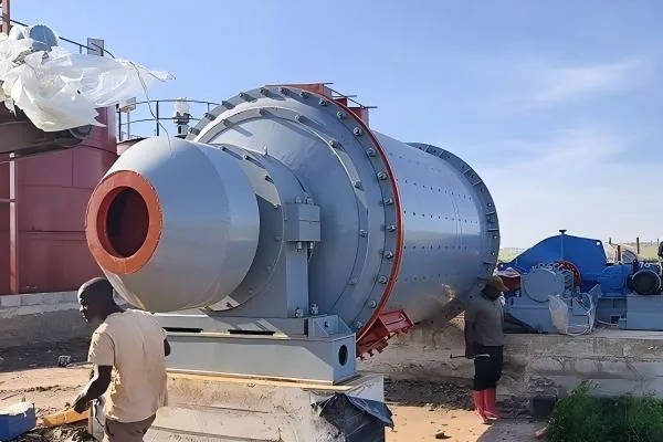 Industrial ball mill positioned during mineral processing plant installation